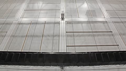 Dispositif de spatialisation sonore multicanal équipant l'Espace de projection et combinant les systèmes WFS et Ambisonics